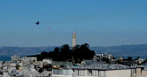 Single Blue Angel Jet over San Francisco Coit Tower 動画素材 288524487