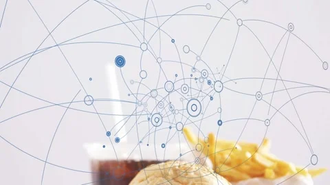 Single blue dot expanding, schematic rings branching over burger, fries, drink, Stock Footage 332667117