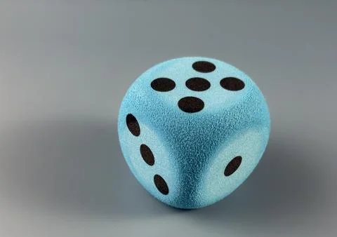 Single Blue Game Dice Symbolizing Chance and Risk Stock Photos