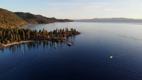 Single Boat Approaching Sand Harbor at Lake Tahoe Stock Footage 114688685