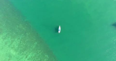 Single boat in ocean Stock Footage 63374982