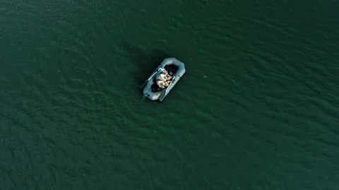 A single boat peacefully drifting on calm waters Vidéo 278674973