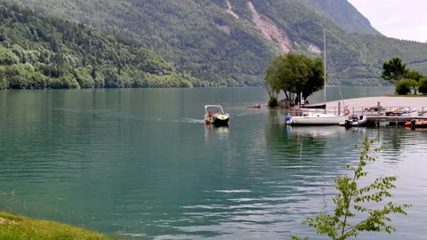 Single boat running Stock Footage 168073276