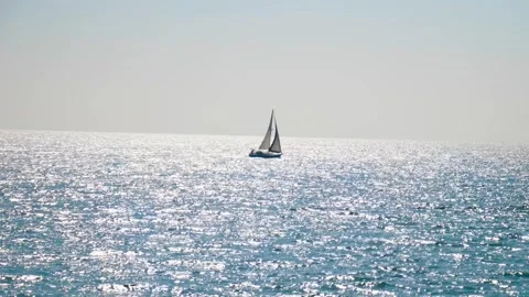 Single Boat Sails In Ocean Slow Motion Stock Footage 302591984