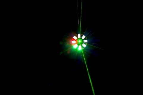 Single brightly coloured disco light Stock Photos