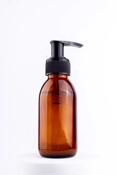 Single brown pump bottle for mock up. Sustainability and eco friendly lifes.. Stock Photos