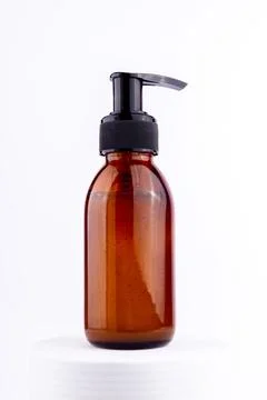 Single brown pump bottle for mock up. Sustainability and eco friendly lifes.. Stock Photos