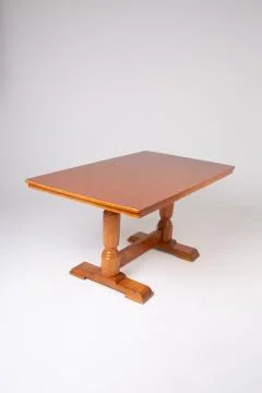 Single brown table with empty surface and carved legs on an isolated Foto stock