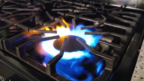 Single Burner Turning on in Slow Motion Stock Footage 276874168