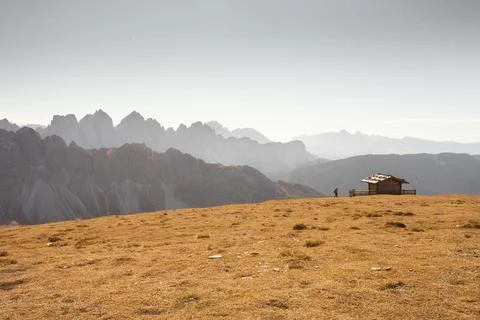 Single cabine over a mountain in Dolomites with wonderful panorama at fall Foto stock