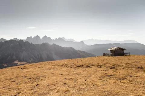 Single cabine over a mountain in Dolomites with wonderful panorama at fall Stock Photos