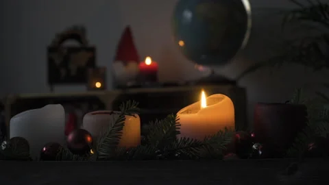 Single candle burning on advent wreath in a living room, 4k, StocFootage Stock Footage 144686037