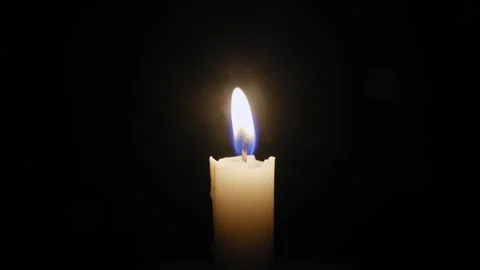 Single Candle Flame Blown Out in the Dark Vídeo Stock 329681042