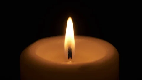 Single Candle Flame Burning in Dark Room Vídeos de archivo 125398417