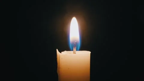 Single Candle Flame Flickering In Darkness Stock Footage 324954214