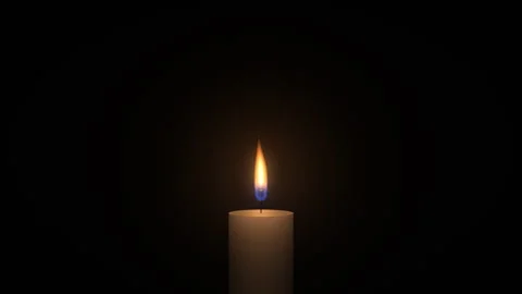 Single candle flame flickering gently in the dark, warm glow, 4K seamless loop 動画素材 347464373