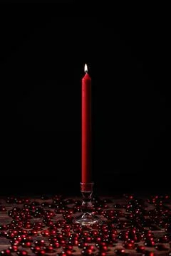 Single candlestick and candle Stock Photos