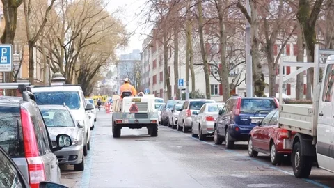 Single car is driving between parked cars Stock Footage 105903590