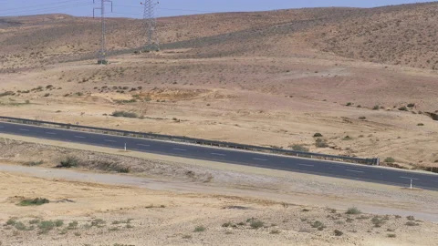 Single car moving over desert Stock Footage 94256378