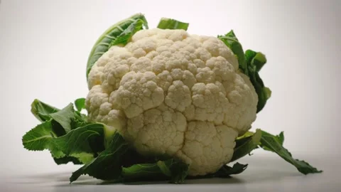 Single Cauliflower Isolated On White Surface Stock Footage 146887037