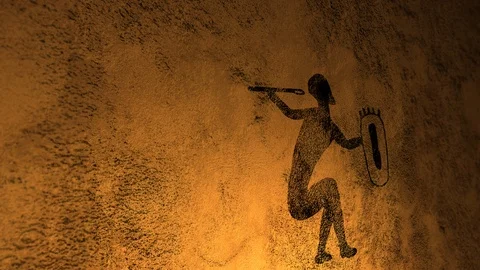 A single Cave Painting of  Warrior with dancing fire illumination on cavern wall Stock Footage 100946300