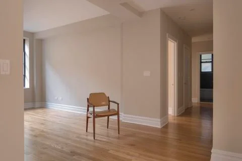 Single chair in empty room Stock Photos