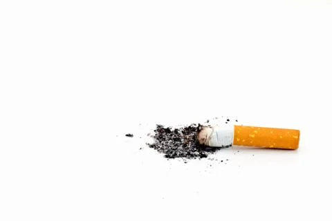 Single cigarette butt with ash isolated on white background Stock Photos