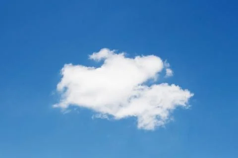 Single cloud on blue sky background Stock-Fotos