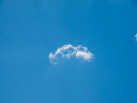 Single Cloud in Clear Blue Sky 写真素材