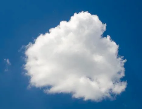 Single cloud in deep blue summer sky Stock Photos