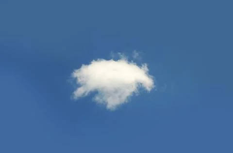 Single cloud isolated over blue sky background Stock Photos