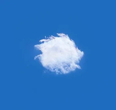 Single cloud isolated over deep blue sky background Stock Photos