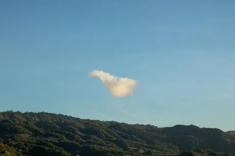 Single Cloud Over Mountain Landscape 스톡 사진