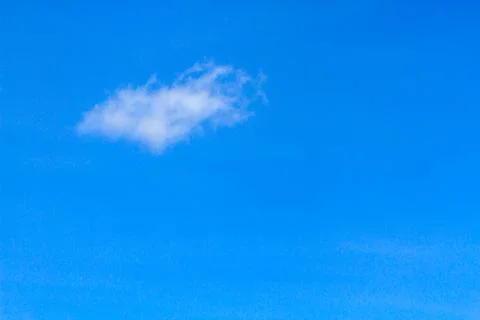 Single clouds in blue sky Stock Photos