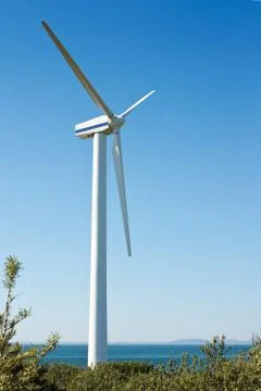 Single coastal wind turbine Stock Photos