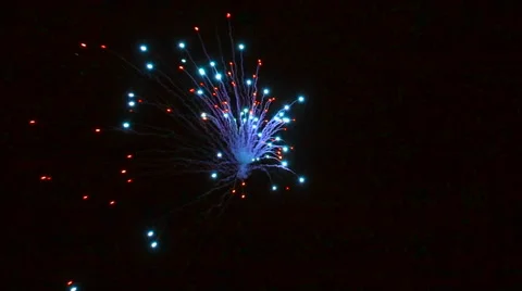 Single colored firework rocket in night Stock Footage 65883258