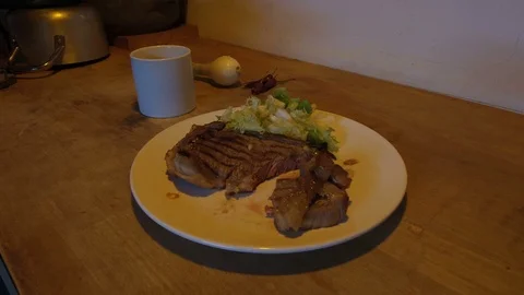 Single cooking a steak at home Video stock 77478935