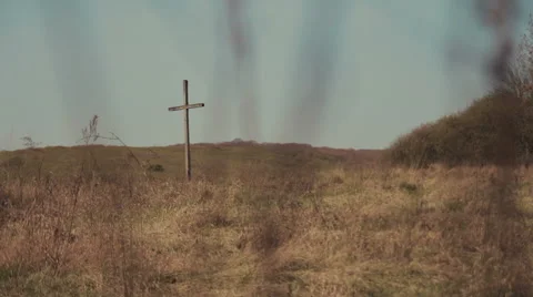 Single Cross in Grass Field Stock Footage 62207636