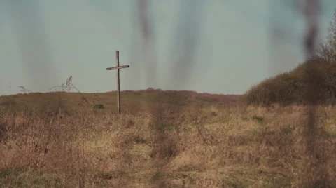 Single Cross in Grass Field Stock Footage 62207771