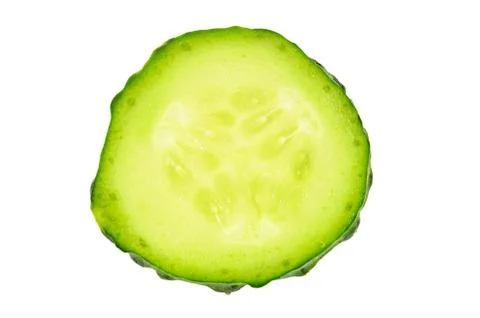 Single cucumber slice on white background Stock Photos