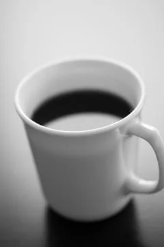 Single cup of black coffee Stock Photos