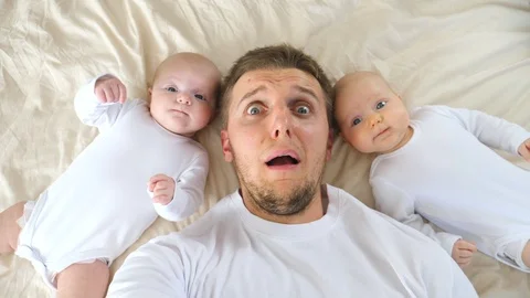 Single Dad Going Nuts At Home With Two Twin Babies. Stock Footage 123522992