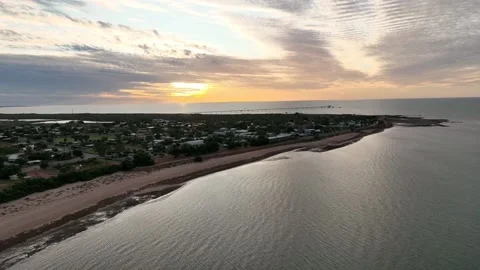 Single Drone Shot of Sun setting in Pilbara Town Onslow in Western Australia Video stock 222039204