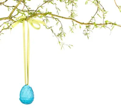 Single easter egg hanging from branch Stock Photos