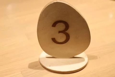 A single egg with the number 3 on it, perfect for illustrations or design Stock Photos