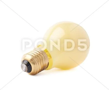 Single electric bulb lying on its side, isolated over the white background Stock Photos