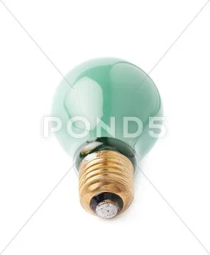 Single electric bulb lying on its side, isolated over the white background Stock Photos