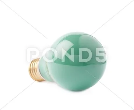 Single electric bulb lying on its side, isolated over the white background Stock Photos