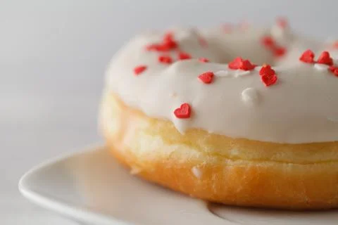 Single elegant donuts on plate Stock Photos