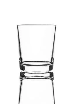 Single empty old fashioned glass isolated on white background. Foto stock